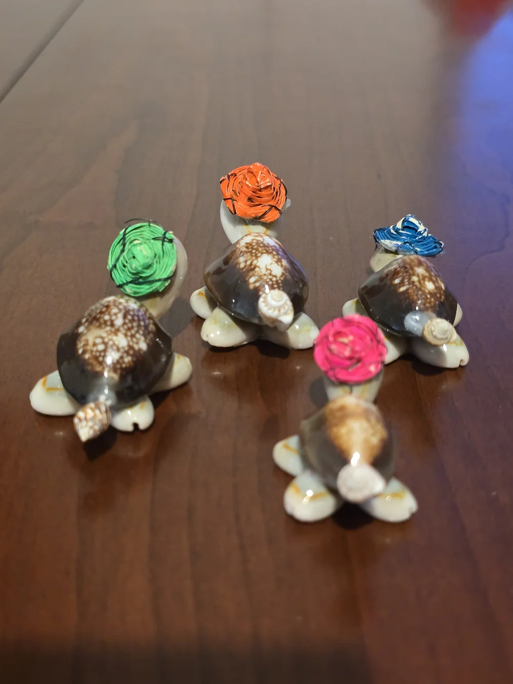 Four Cute Handmade Mini Turtles Made From Seashells with Glasses and Straw Hats